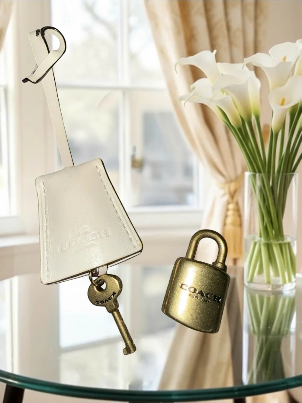 Authentic COACH Chalk White Leather Clochette & Antique Gold Padlock Charm Set